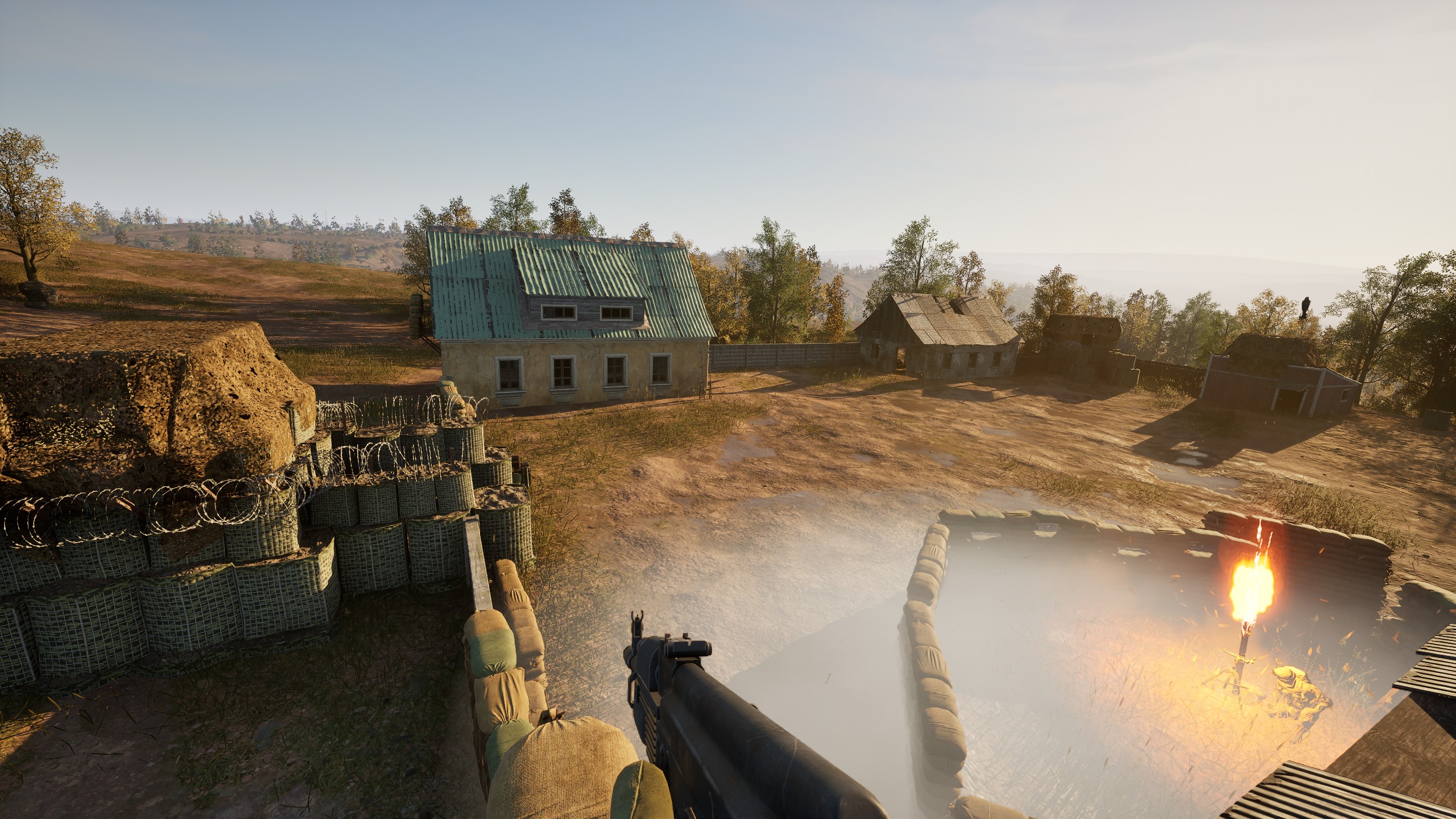 Mortar firing from a fortified position at sunset