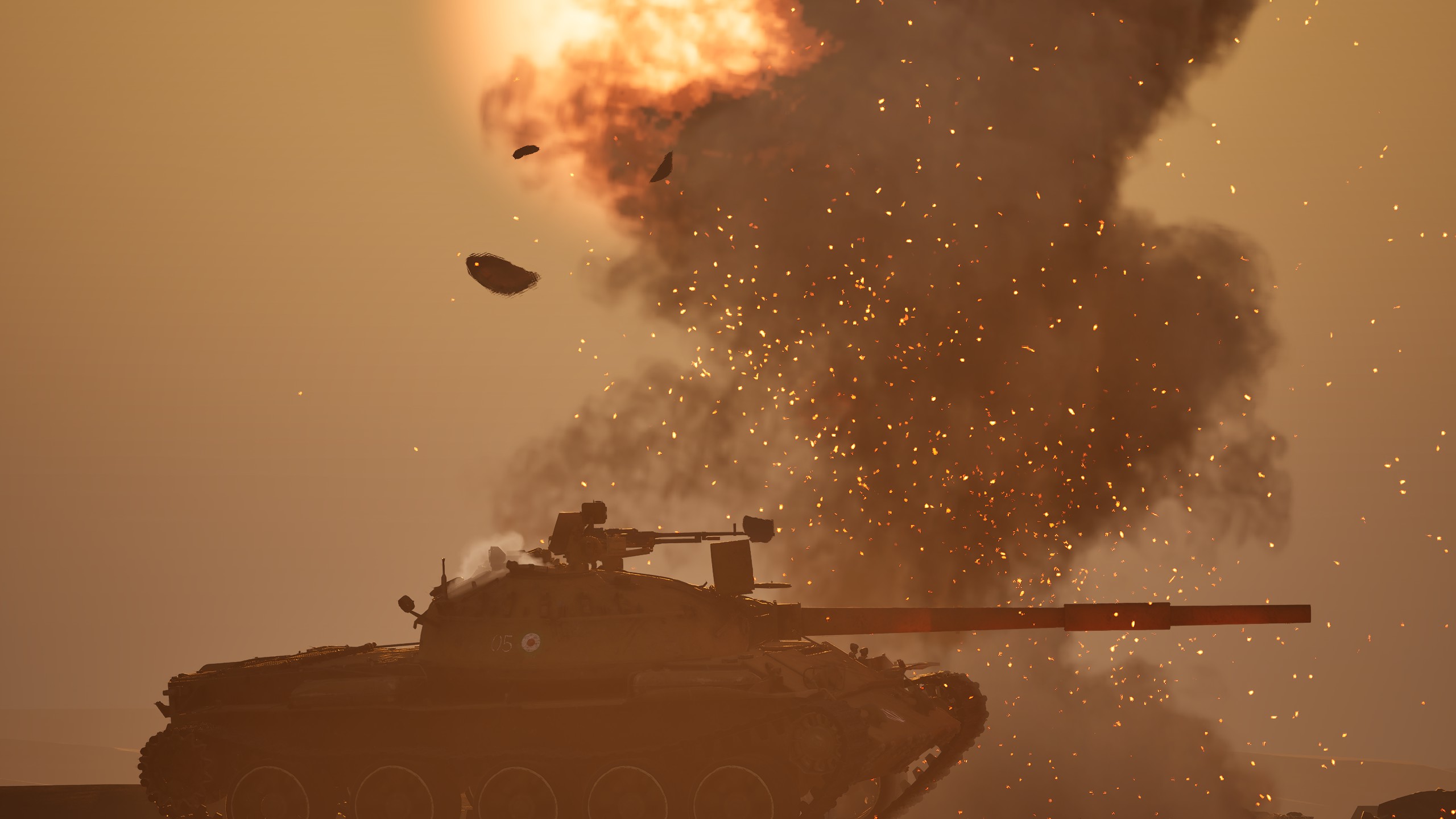Tank advancing across open terrain