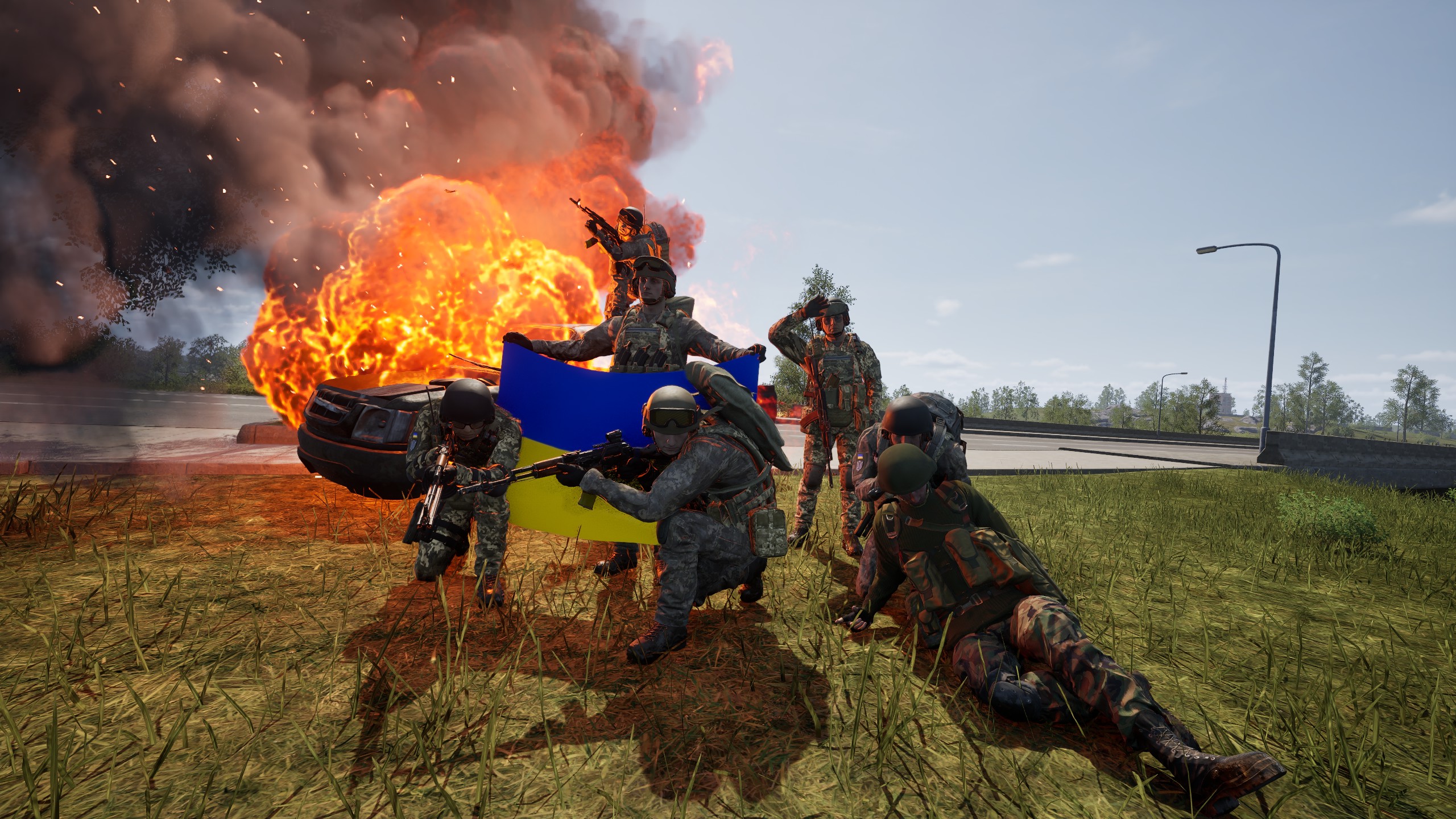 Squad holding Ukrainian flag in front of a massive explosion